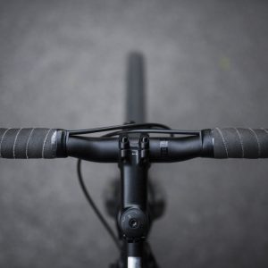 closeup-sports-bicycle-s-front-set-handles-shot-black-white_181624-1564